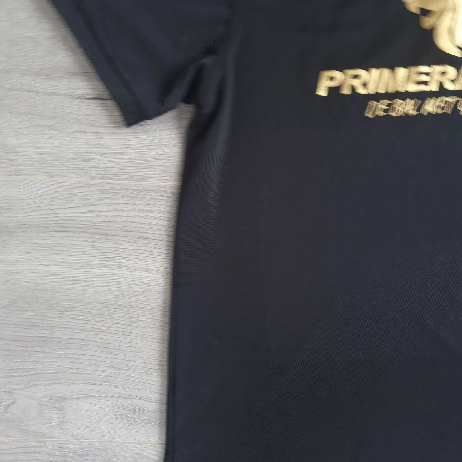Polo deportivo negro KELME – Logo Primerastar Gold – Talla L / XL – photo 9